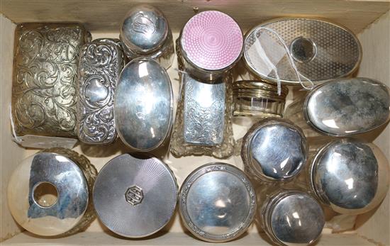 A Victorian embossed silver-mounted cut glass box (a.f) and 15 other silver mounted toilet jars and boxes